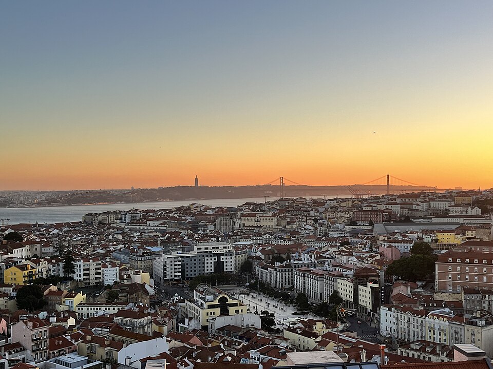 Watch sunset from a miradouro — Lisbon
