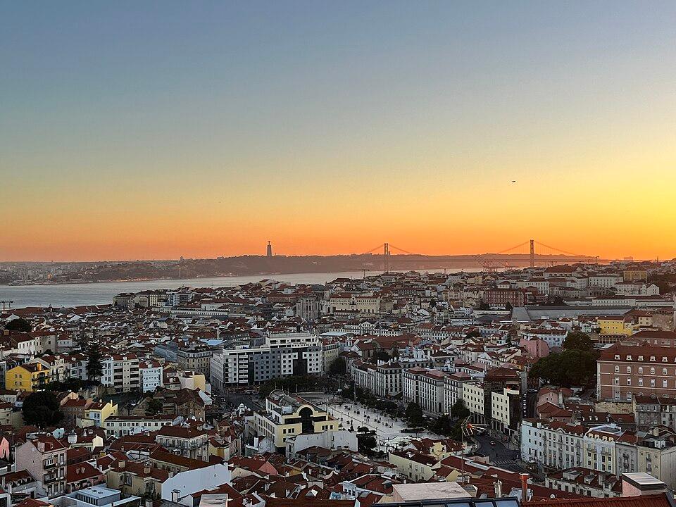Watch sunset from a miradouro — Lisbon